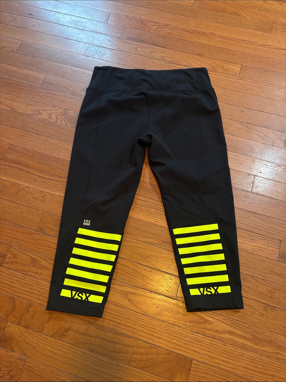 VSX Black Leggings with Neon Yellow Stripes. Size Large.